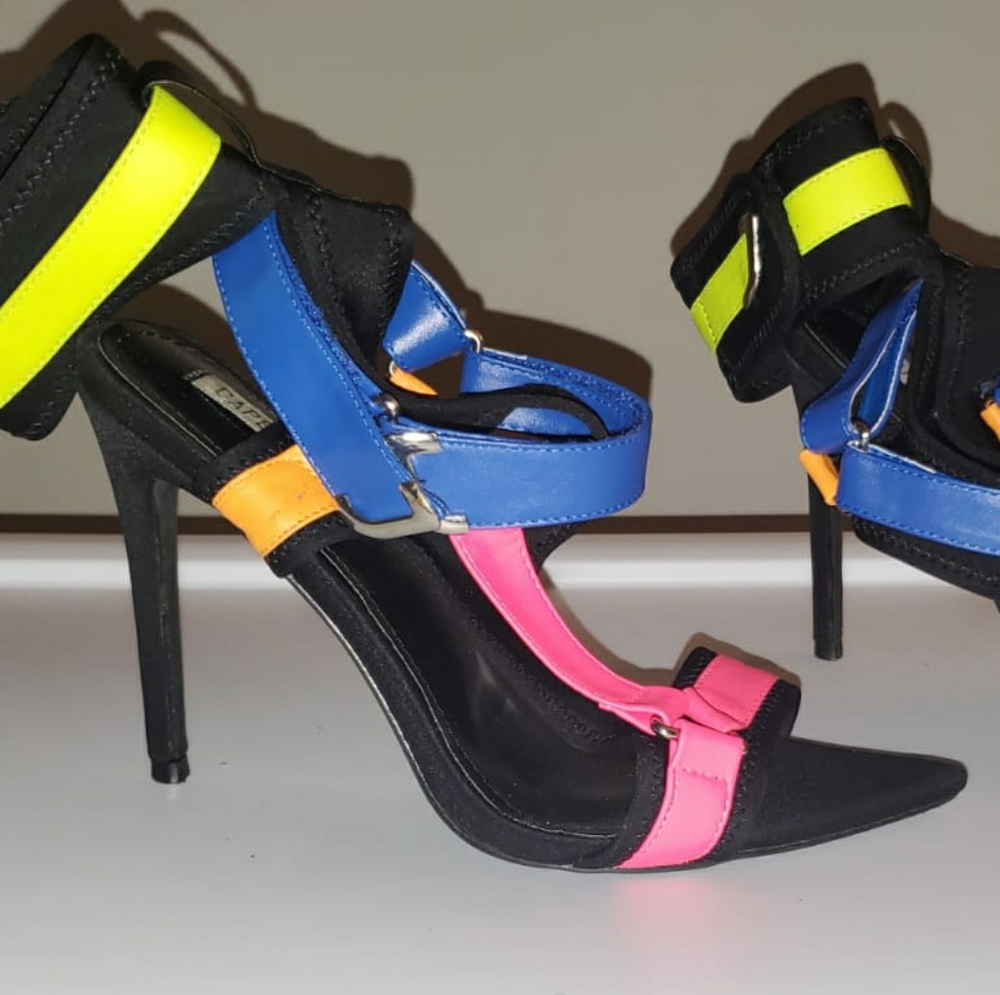 Size 8 pointy open toe high heel sandals.